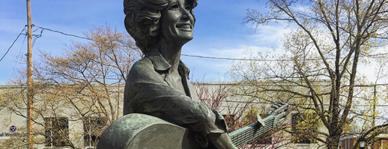 The History Of The Dolly Parton Statue In Sevierville