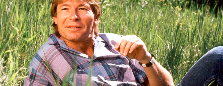 The Story Behind John Denver’s “Thank God I’m A Country Boy”